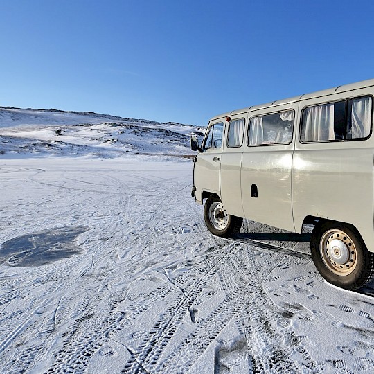 Van on a frozen lake