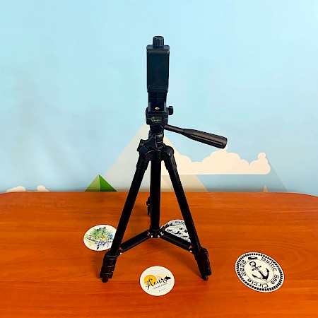Tripod with mounted cell phone holder